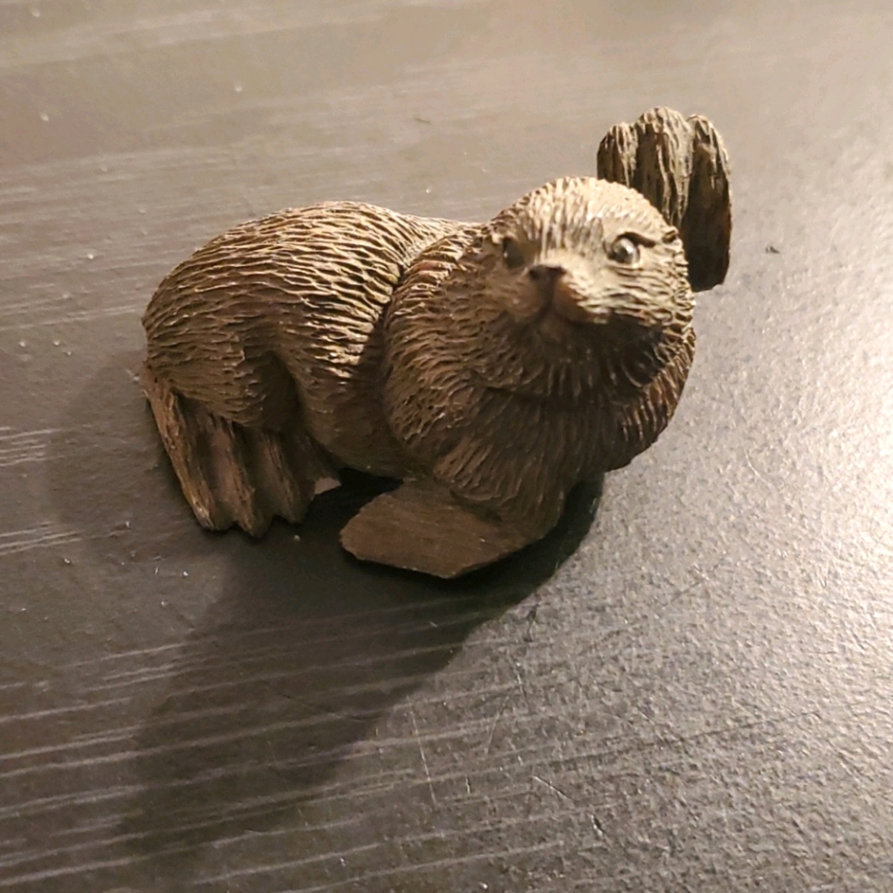 Wood otter figurine